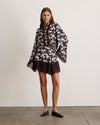 Chocolate Joan Skirt with lace hem on a model wearing a matching floral top