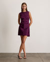 Purple Tallulah Dress on a model, sleeveless with a fitted silhouette and knee-length hem.