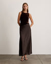 Chocolate Vivian Gown on a model, sleeveless with a floor-length design.